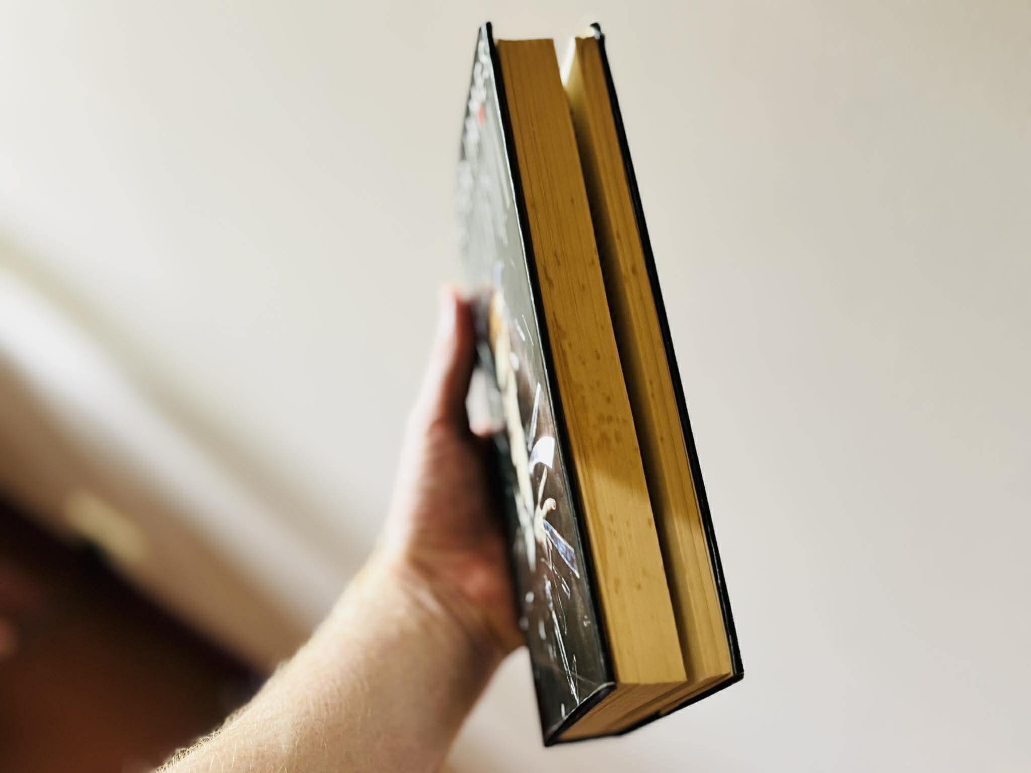 Peter James's book Possession shown from the side, the pages split open to reveal something hidden...